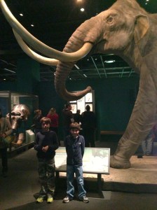 The boys are bigger but they look small next to that mammoth. 